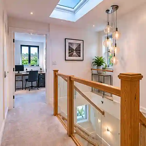 Finished loft bedroom in Raynes Park SW20 L-shaped dormer conversion